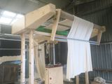 an image of a machine that is being worked on a piece of wood