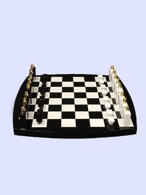 un échiquier noir et blanc sur lequel sont disposées des pièces d'échecs