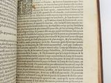 an open book with a picture of a cat on it