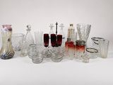 a lot of glass items that are sitting on a table