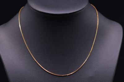 a gold chain necklace on a mannequin mannequin mannequin mannequin mannequin mannequin mannequin mannequin manne
