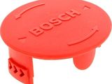 the base of a red plastic stool with the word bossut written on it