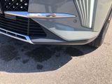a close up of a car ' s grille and front bumper