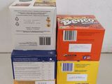 three boxes of cereal sitting on top of each other on a table
