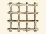 a picture of a metal fence made of bamboo sticks