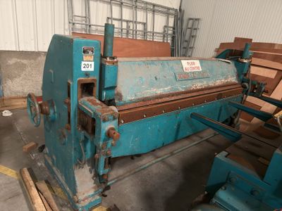 an image of a machine that is sitting in a warehouse