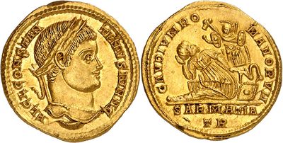 a gold coin with an image of a woman on it