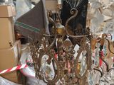 a chandelier that is sitting on a table in a room