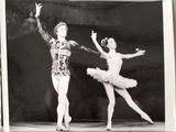 black and white photograph of two ballerinas in tutu posing for a picture