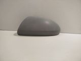 a gray object sitting on top of a white surface