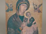 wooden icon of the virgin mary and child jesus with doves