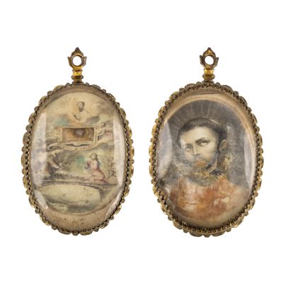 pair of antique portraits of a woman and a man