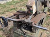 a machine that is sitting on a pallet in the grass