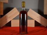 a bottle of wine that is sitting on a table