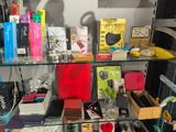 a glass shelf that has many different items on it