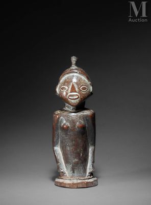 an image of a wooden statue of a man with a face