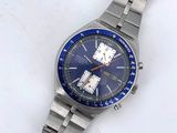 an image of a close up of a wrist watch on a white surface