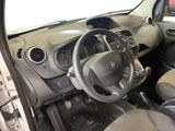 the interior of a car with a steering wheel and dashboard controls