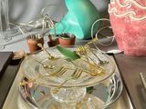 a tray that has a glass bowl on top of it
