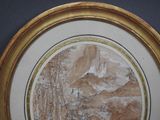 a picture of a picture of a mountain scene in a gold frame