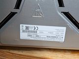 a close up of a laptop on a wooden table