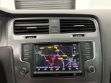 an image of a car with a gps device in the dash