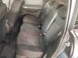 the back seats of a car with a seat belt in a car