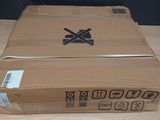 a cardboard box with a sticker on it sitting on a table