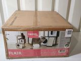 a cardboard box with a cat inside of it