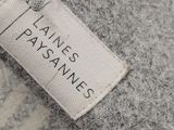 the label of a women ' s cashmere sweater is shown on the label