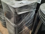 a stack of microwaves wrapped in plastic on a pallet