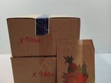 three boxes that are sitting next to each other on a table