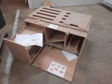 a desk that has a lot of boxes and papers on it
