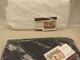 a plastic sheet and a plastic bag on the floor