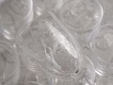 many empty wine glasses sitting on a table