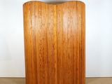 a large wooden cutting board on the floor