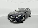 the mercedes gla suv is parked in a white room