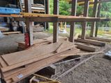 several pieces of wood are stacked on top of each other in a building