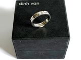 a ring that is sitting in a box on a table
