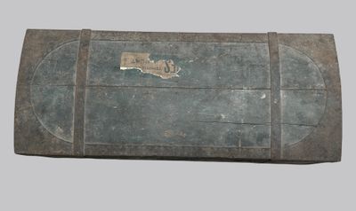 an old suitcase that has a map on it