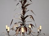 an image of a chandelier made out of metal leaves