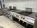 many stainless steel appliances in the kitchen of this restaurant