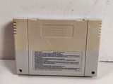 a close up of a nintendo game on a white surface