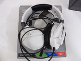 a pair of headphones sitting on top of a box