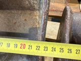 a measuring tape that is on the side of a machine