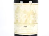 a bottle of wine that is sitting on a table