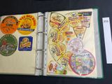 a binder with a lot of stickers on it