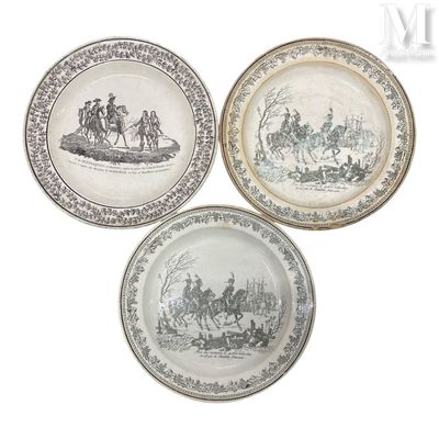 three plates with a picture of a man on horseback and a woman on a horse