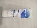a tube of toothpaste sitting on a table