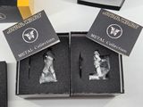 two star wars figurines in a box on a table